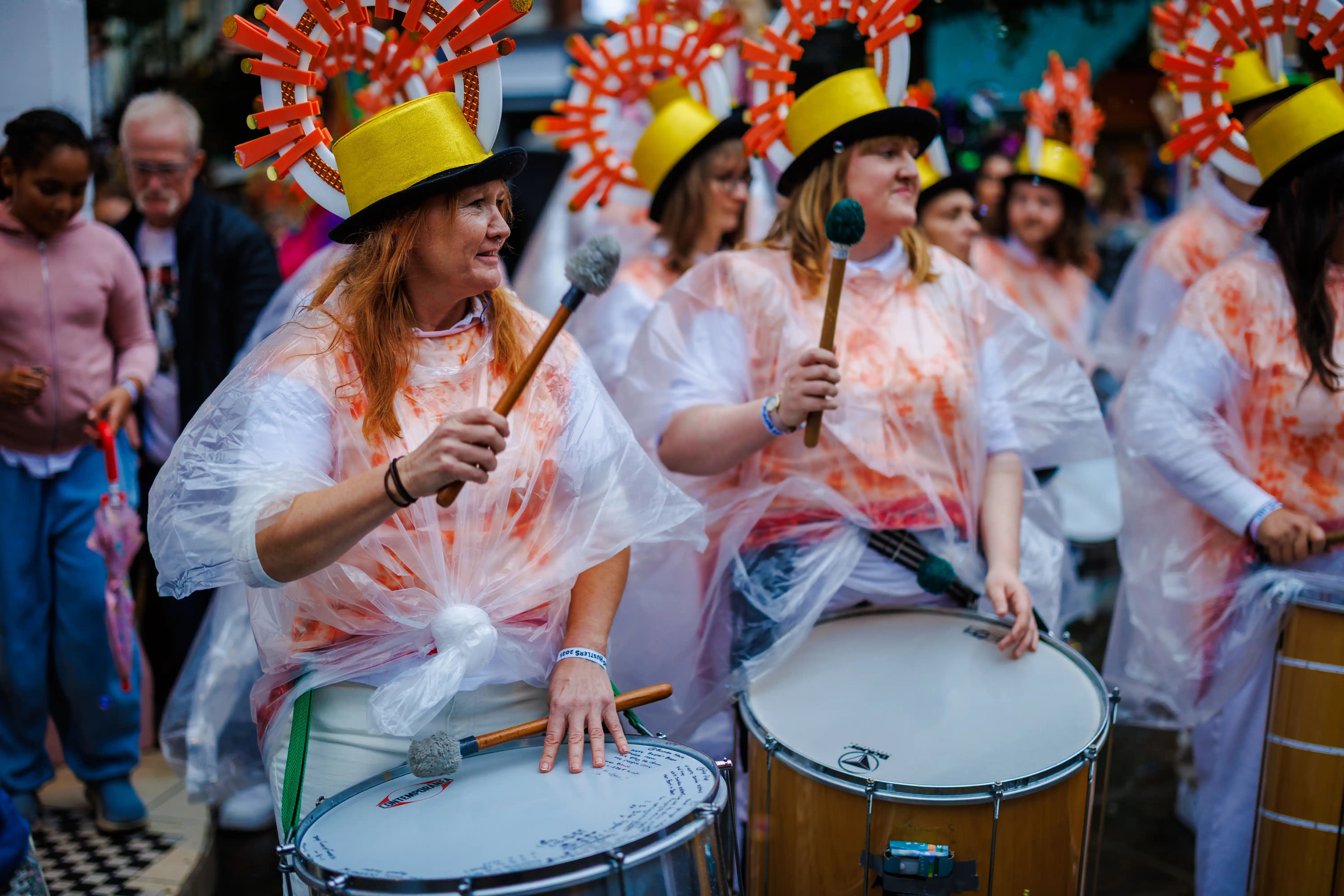 Samba drummers leading the Hustle Parade